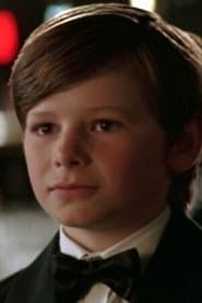 Gus Lewis as Bruce Wayne (Age 8) (archive footage) (uncredited)