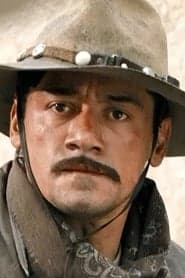 Israel Islas as Román "El Sacristán" Urías
