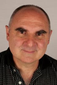 Luc Palun as Amandine's Grocer