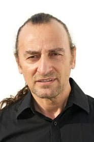 Piotr Baumann as Piotr