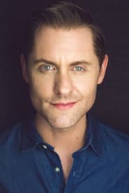Michael McCorry Rose as Wiz-O-Mania Narrator