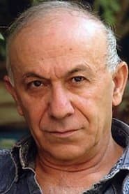 Ezra Dagan as Rabbi Menasha Lewartow