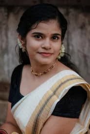 Priya S Babu as Brinto's wife