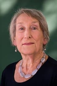 Janet Henfrey as Society Maven