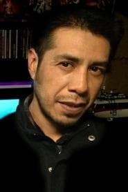 Salvador Reyes as Security Guard (voice)