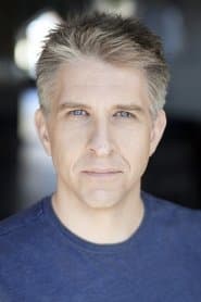 Shawn Campbell as TV Anchor