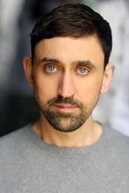 Joseph Macnab as Police Officer 1