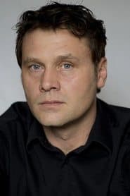 Victor Cornfoot as Surveillance Guard