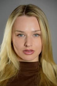 Elizabeth Zacero as News Anchor