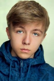 Austin Haynes as Young Boy