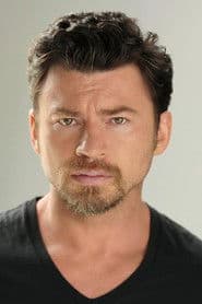 William Mark McCullough as Commander Dennis Dunphy