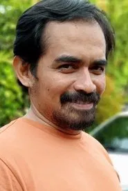 Eduwart Manalu as Sutomo