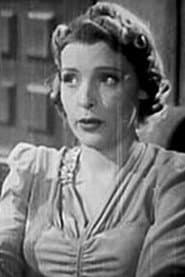 Florence Wright as Blonde Secretary