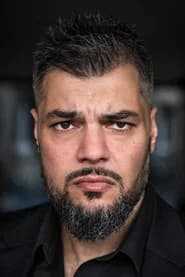 Imad Mardnli as Bodyguard #1