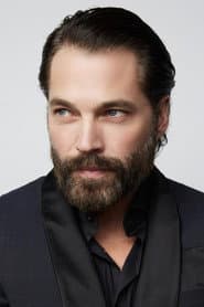 Tim Rozon as John