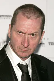Frank Miller as Priest