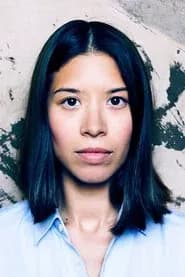 Claire Tran as Flight Attendant