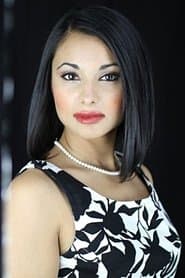 Sonia Sunger as News Reporter (Irene)