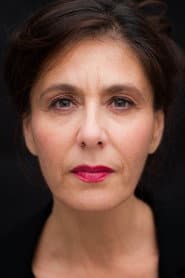 Valérie Zarrouk as Dominique's Wife
