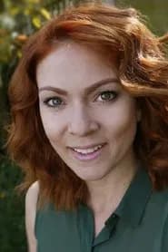 Honey Holmes as Russian Bidder Girlfriend