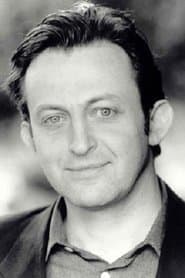 Hamish McColl as Photographer