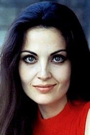 Olga Karlatos as Woman in Puppet Theatre