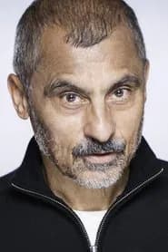 Vincent Ebrahim as Driver in Desert