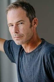 Chad Bruce as The Priest