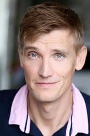 Lennard Ridsdale as Man in Suit #3