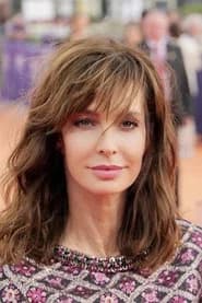 Anne Parillaud as Prague Concierge