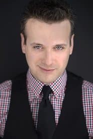 Simon MacIntyre as Business Passerby (uncredited)