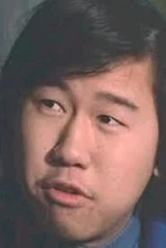 Alan Chan Kwok-Kuen as Man in Crowd Outside Cafe