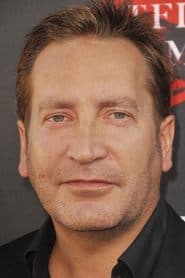 Ronan Vibert as Janina's Husband