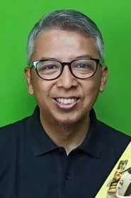 Daan Aria as Bandung Raya School Headmaster