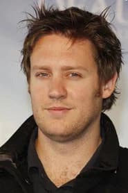 Mike Blomkamp as Police Officer