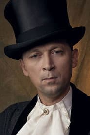 Marek Wrona as Toffel’s Secretary