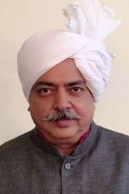 Karamveer Choudhary as Father of Mahaveer Singh Fogat