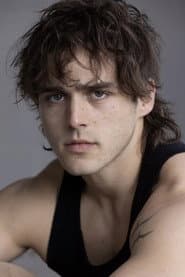 Charlie Gillespie as Ezra Stone