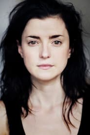 Laura Rees as Record Company Executive