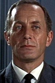 Peter Burton as Junior Minister