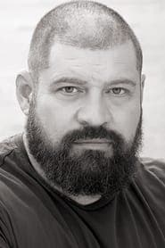 Brad William Henke as Miles