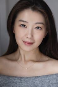 Melissa Xiao as Newscaster