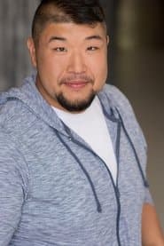 Earl T. Kim as Korean Train Passenger
