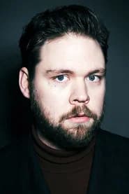 Ari Freyr Isfeld Oskarsson as KGB Officer