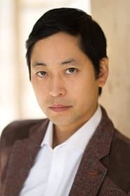 Chike Chan as Chinese Police Officer