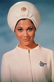 Edwina Carroll as Aries-1B Stewardess