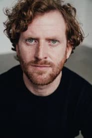 Ben Plunkett-Reynolds as Wiry Guy