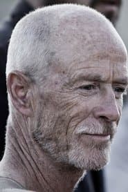 Patrick Connolly as Veteran Cop
