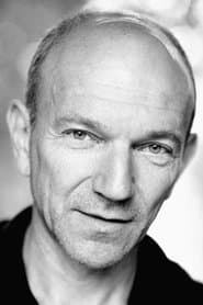 Dominic Grant as Angry Guard