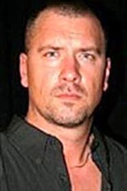 Christopher Marren as Reporter (V/O) (voice) (as Chris Marren)